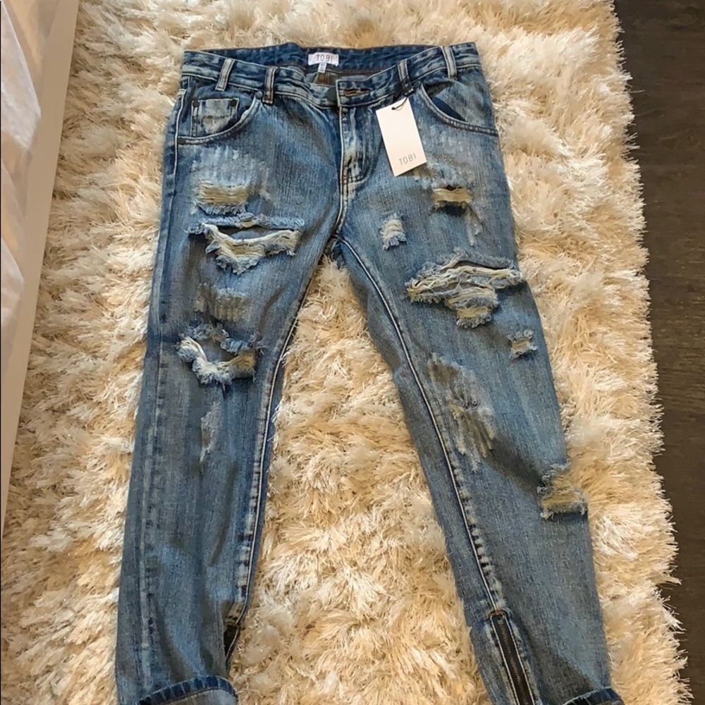 NEVER WORN JEANS